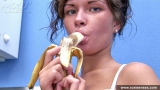 Teen brunette toying in kitchen