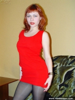 Teen redhead undresses and posing