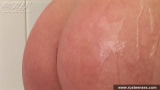 Teen blonde masturbates taking shower