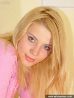 Russian teen blonde with sexy eyes shows her pussy