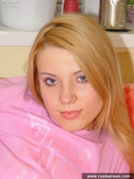 Russian teen blonde with sexy eyes shows her pussy