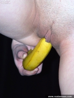 Russian teen masturbates her shaved pussy with banana