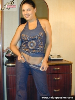 Brunette ripping tan pantyhose