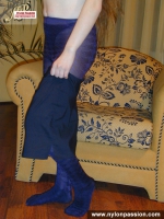 Teen in purple pantyhose posing