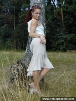 Pantyhose teen girl posing in nylon outdoor