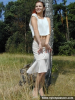 Pantyhose teen girl posing in nylon outdoor