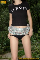 Pissing outdoor on a concrete slab