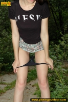 Pissing outdoor on a concrete slab