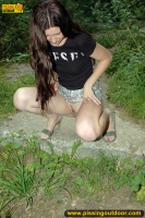 Pissing outdoor on a concrete slab