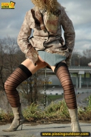 Teen walking and pissing outdoor