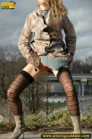 Teen walking and pissing outdoor