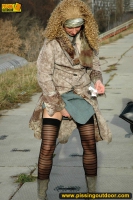 Teen walking and pissing outdoor