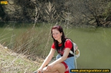 Pissing outdoor near the pond