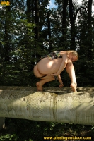 Teen blonde pissing outdoor on tubes
