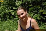 Teen blonde pissing pool in a park