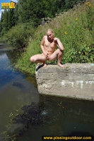 Pissing teen blonde pisses in the pool outdoor