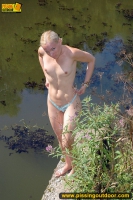 Pissing teen blonde pisses in the pool outdoor