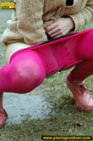 MILF brunette walks outdoor and pissing in the nature