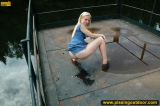 Outdoor pissing on a village embankment