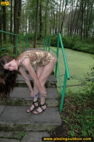 Outdoor pissing in the park on stone tiles