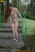 Outdoor pissing in the park on stone tiles