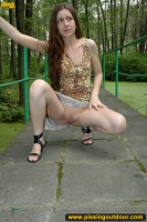 Outdoor pissing in the park on stone tiles