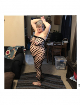 Chubby Kim posing in new outfit.