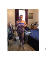 Chubby Kim posing in new outfit.