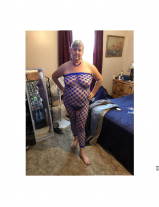 Chubby Kim posing in new outfit.