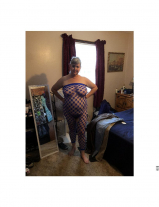 Chubby Kim posing in new outfit.