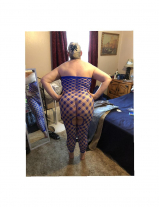 Chubby Kim posing in new outfit.