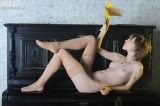 Naked girl on piano