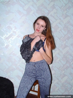 Young longhaired brunette stripping - N