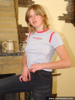 Russian teen blonde masturbates near fireplace - N