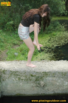 Pissing in the black pool outdoor - N