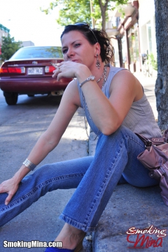 Sensual smoking vixen Mina enjoys blowing smoke rings - N