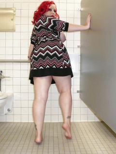 April washes her feet in the ladys room - N