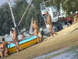 Clothing optional beach with a lot of ladies running around