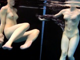 Two girls swim and get naked sexy