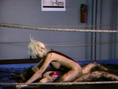 Bombshells wrestling in the muddy ring