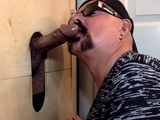 Gloryhole DILF sucking and tugging black cock