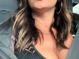 Busty curly brunette with big boobs fucks on couch
